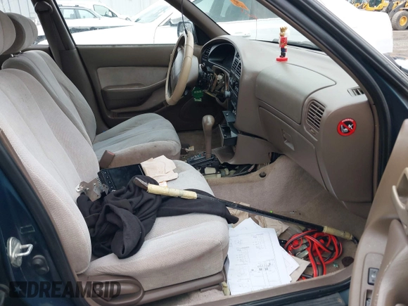 1996 Toyota Camry LE z VIN 4T1EF12K9TU116427, wystawiony jako IAAI lot #38696498 z przebiegiem 242 599 mil mil oraz . Historia ofert i sprzedaży dostępna na DreamBid. Obrazek 5.