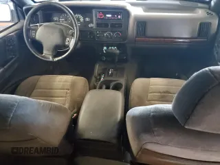 1997 Jeep Grand Cherokee Laredo with VIN 1J4GZ58SXVC723703, listed as a Copart auction lot 89216845 with 247,398 mi miles and Clean Title. Bid and sale history available at carsss.com. Image 8.