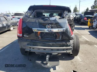 2015 Cadillac SRX Performance Collection с VIN 3GYFNCE38FS607680, выставлен на аукционе Copart как лот 62929235 с пробегом 55 638 миль миль и Списание • Salvage title. История ставок и продаж доступна на DreamBid. Изображение 6.