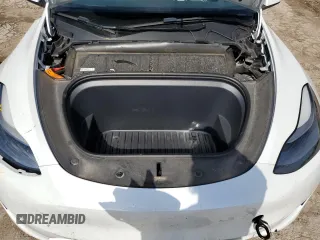 2023 Tesla Model Y Long Range with VIN 7SAYGAEE6PF795434, listed as a Copart auction lot 67507984 with 24,469 mi miles and Salvage Title. Bid and sale history available at DreamBid. Image 12.