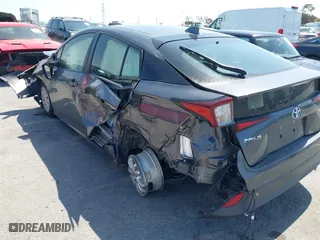 2020 Toyota Prius L Eco with VIN JTDKARFU3L3111990, listed as a IAAI auction lot 41964834 with 67,873 mi miles. Bid and sale history available at carsss.com. Image 6.