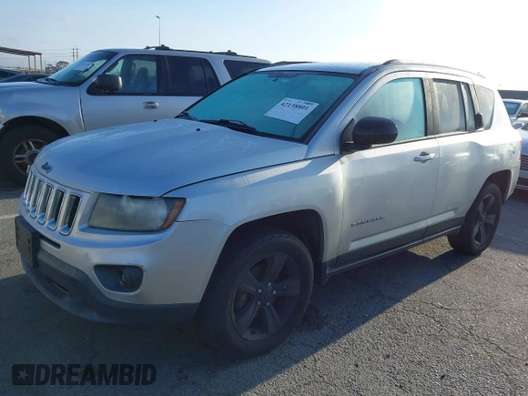 2014 Jeep Compass Sport with VIN 1C4NJDBB4ED567515, listed as a IAAI auction lot 42138801 with 183,673 mi miles. Bid and sale history available at carsss.com. Image 2.