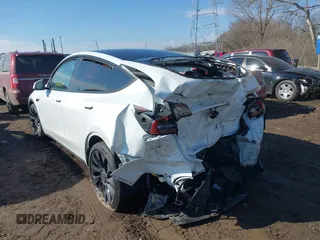 2024 Tesla Model Y Performance with VIN 7SAYGDEF3RA281969, listed as a IAAI auction lot 41680674 with 22,615 mi miles and . Bid and sale history available at DreamBid. Image 3.
