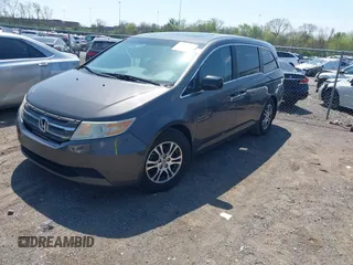 2013 Honda Odyssey EX-L with VIN 5FNRL5H65DB011071, listed as a IAAI auction lot 41992265 with 192,624 mi miles and . Bid and sale history available at DreamBid. Image 17.