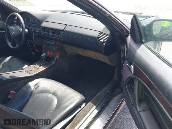 2001 Mercedes-Benz SL-Class with VIN WDBFA68F71F196390, listed as a IAAI auction lot 42128119 with 65,010 mi miles. Bid and sale history available at carsss.com. Image 5.