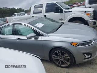 2020 Ford Fusion Titanium с VIN 3FA6P0K91LR128016, выставлен на аукционе IAAI как лот 41947905 с пробегом 79 622 миль миль и . История ставок и продаж доступна на DreamBid. Изображение 13.