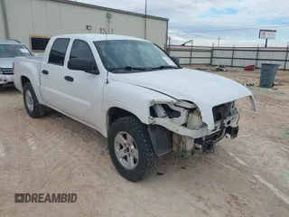 2007 Mitsubishi Raider LS with VIN 1Z7HC28K87S174381, listed as a IAAI auction lot 41364658 with 156,976 mi miles. Bid and sale history available at carsss.com. Image 1.