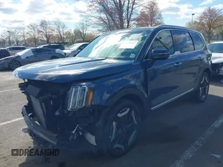 2023 Kia Telluride S z VIN 5XYP64GC7PG366160, wystawiony jako IAAI lot #41973967 z przebiegiem 36 190 mil mil oraz . Historia ofert i sprzedaży dostępna na DreamBid. Obrazek 2.