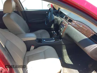 2013 Chevrolet Impala LTZ with VIN 2G1WC5E35D1175879, listed as a IAAI auction lot 42143602 with 156,385 mi miles and . Bid and sale history available at DreamBid. Image 5.