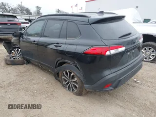 2023 Toyota Corolla Cross Hybrid S with VIN 7MUFBABG6PV010999, listed as a IAAI auction lot 41489541 with 14,707 mi miles and . Bid and sale history available at DreamBid. Image 3.