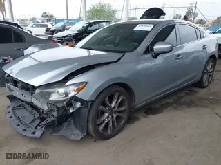 2017 Mazda Mazda6 Touring with VIN JM1GL1V59H1122054, listed as a IAAI auction lot 41896616 with 114,422 mi miles. Bid and sale history available at carsss.com. Image 18.