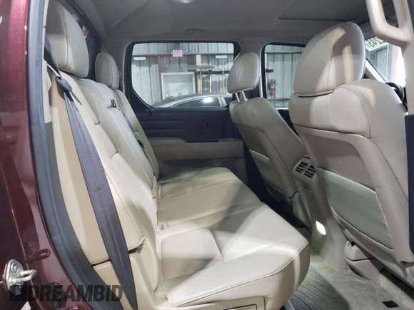 2013 Honda Ridgeline RTL with VIN 5FPYK1F59DB018582, listed as a Copart auction lot 61022245 with 126,892 mi miles and Salvage title. Bid and sale history available at DreamBid. Image 10.