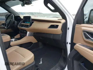 2023 Chevrolet Suburban Premier with VIN 1GNSKFKT1PR529998, listed as a IAAI auction lot 41157457 with 21,551 mi miles and . Bid and sale history available at DreamBid. Image 5.