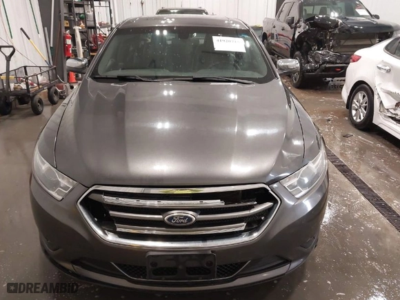 2015 Ford Taurus Limited with VIN 1FAHP2F87FG136199, listed as a IAAI auction lot 41920715 with 173,445 mi miles. Bid and sale history available at carsss.com. Image 12.