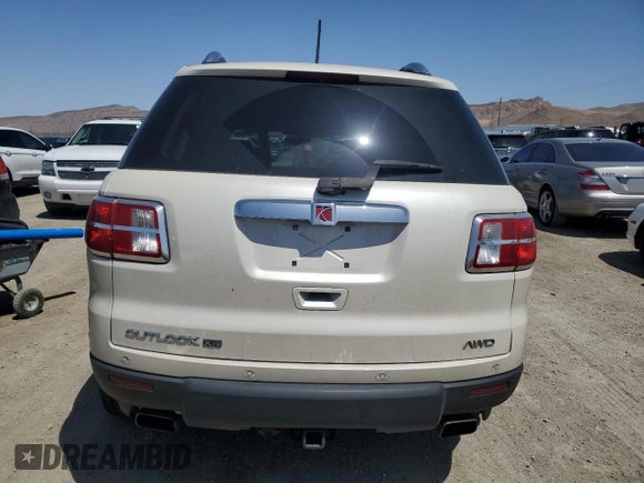 2007 Saturn Outlook XR z VIN 5GZEV23717J174383, wystawiony jako Copart lot #66915944 z przebiegiem 128 885 mil mil oraz Szkoda całkowita • Salvage title. Historia ofert i sprzedaży dostępna na DreamBid. Obrazek 6.