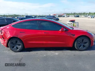 2023 Tesla Model 3 with VIN 5YJ3E1EA2PF588467, listed as a IAAI auction lot 42254921 with 11,217 mi miles and . Bid and sale history available at DreamBid. Image 14.