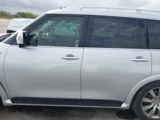 2014 Infiniti QX80 z VIN JN8AZ2NE0E9063701, wystawiony jako IAAI lot #41891388 z przebiegiem 178 249 mil mil oraz . Historia ofert i sprzedaży dostępna na DreamBid. Obrazek 14.
