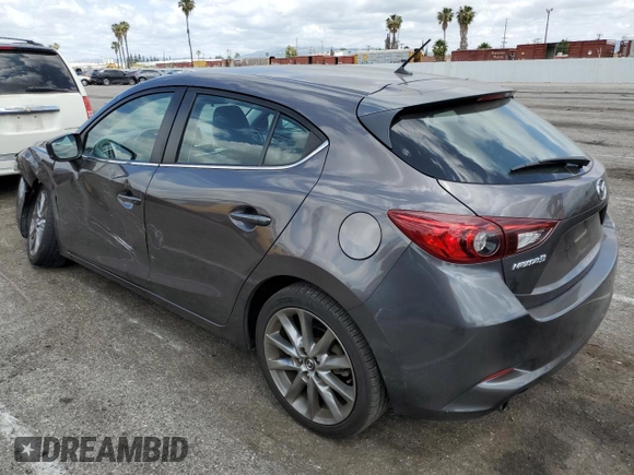 2018 Mazda 3 Touring z VIN 3MZBN1L38JM219466, wystawiony jako Copart lot #56766025 z przebiegiem 124 775 mil mil oraz Szkoda całkowita • Salvage title. Historia ofert i sprzedaży dostępna na DreamBid. Obrazek 2.