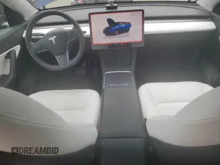 2022 Tesla Model Y Long Range z VIN 7SAYGDEE6NF429651, wystawiony jako Copart lot #57172355 z przebiegiem 19 499 mil mil oraz Szkoda całkowita • Salvage title. Historia ofert i sprzedaży dostępna na DreamBid. Obrazek 8.