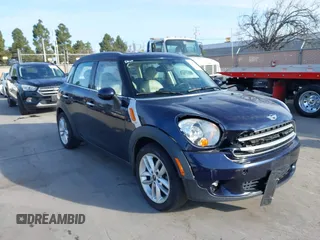 2014 MINI Countryman with VIN WMWZB3C50EWR42268, listed as a IAAI auction lot 41845750 with 117,192 mi miles and . Bid and sale history available at DreamBid. Image 6.