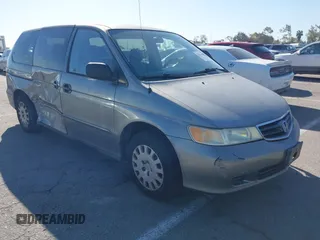 2002 Honda Odyssey LX z VIN 2HKRL18542H553437, wystawiony jako IAAI lot #41824481 z przebiegiem 222 428 mil mil oraz . Historia ofert i sprzedaży dostępna na DreamBid. Obrazek 1.