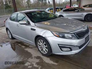 2014 Kia Optima EX z VIN 5XXGN4A79EG306705, wystawiony jako IAAI lot #41933966 z przebiegiem 110 839 mil mil oraz . Historia ofert i sprzedaży dostępna na DreamBid. Obrazek 1.