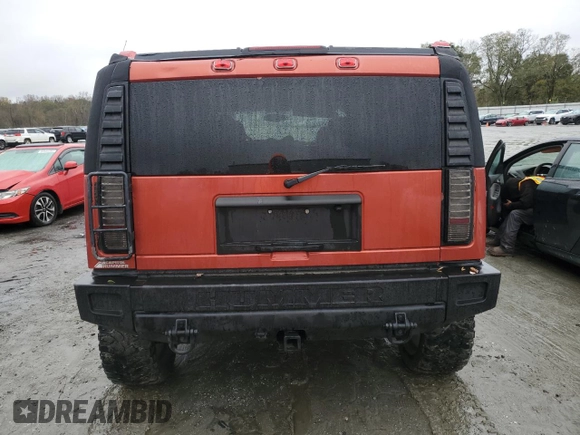 2003 Hummer H2 with VIN 5GRGN23U33H136931, listed as a Copart auction lot 80671794 with 127,137 mi miles and Salvage Title. Bid and sale history available at carsss.com. Image 6.