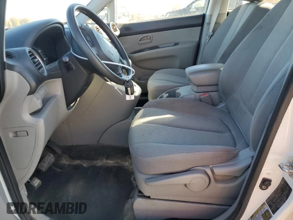 2009 Kia Rondo LX Base with VIN KNAFG528X97249865, listed as a Copart auction lot 77695784 with 149,723 mi miles and Clean Title. Bid and sale history available at carsss.com. Image 7.