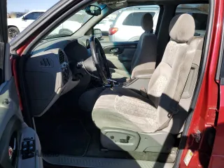 2004 GMC Envoy SLT with VIN 1GKDT13S542243359, listed as a Copart auction lot 79068994 with 199,062 mi miles and Salvage Title. Bid and sale history available at carsss.com. Image 7.