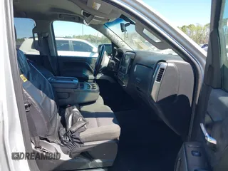 2018 Chevrolet Silverado 1500 LT with VIN 1GCVKREC9JZ335603, listed as a IAAI auction lot 41853399 with 152,460 mi miles and . Bid and sale history available at DreamBid. Image 5.