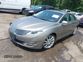 2016 Lincoln MKZ z VIN 3LN6L2J97GR617086, wystawiony jako IAAI lot #42446924 z przebiegiem 107 591 mil mil oraz . Historia ofert i sprzedaży dostępna na DreamBid. Obrazek 17.