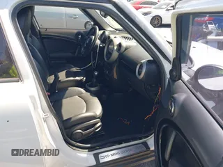 2012 MINI Countryman S with VIN WMWZC5C54CWM11869, listed as a IAAI auction lot 42265935 with 100,102 mi miles and . Bid and sale history available at DreamBid. Image 5.