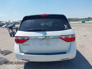 2012 Honda Odyssey EX-L with VIN 5FNRL5H61CB019215, listed as a IAAI auction lot 41837320 with 248,498 mi miles and . Bid and sale history available at DreamBid. Image 17.