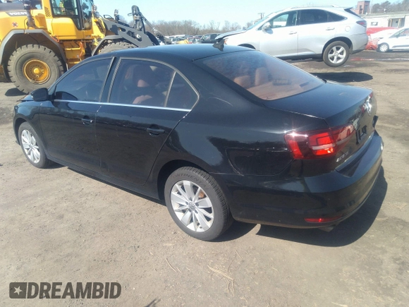 2016 Volkswagen Jetta Sedan 1.4T SE with VIN 3VWD67AJXGM242539, listed as a IAAI auction lot 38948493 with 121,876 mi miles. Bid and sale history available at carsss.com. Image 3.
