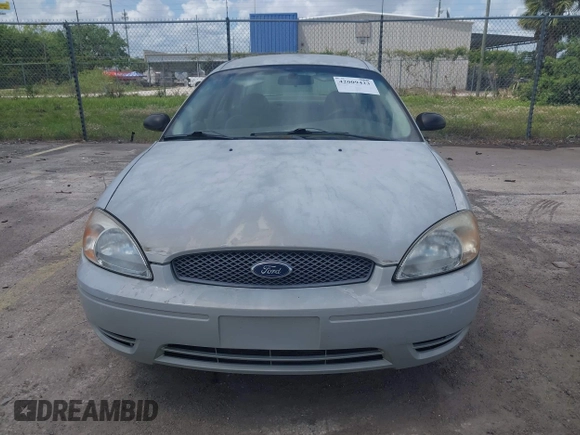 2006 Ford Taurus SE with VIN 1FAFP53U56A209213, listed as a IAAI auction lot 42009423 with 118,083 mi miles. Bid and sale history available at carsss.com. Image 6.