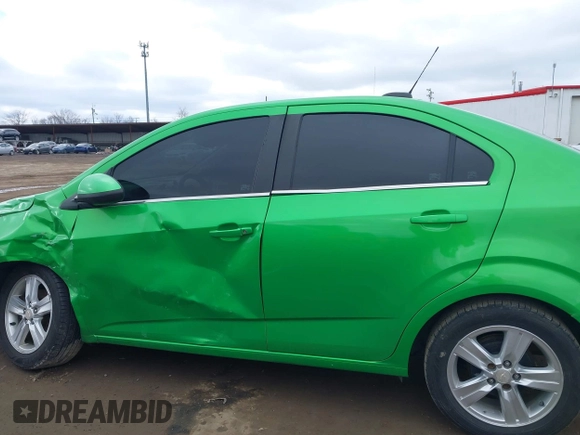 2015 Chevrolet Sonic LT with VIN 1G1JC5SH7F4104412, listed as a IAAI auction lot 41737655 with 124,304 mi miles and . Bid and sale history available at DreamBid. Image 14.