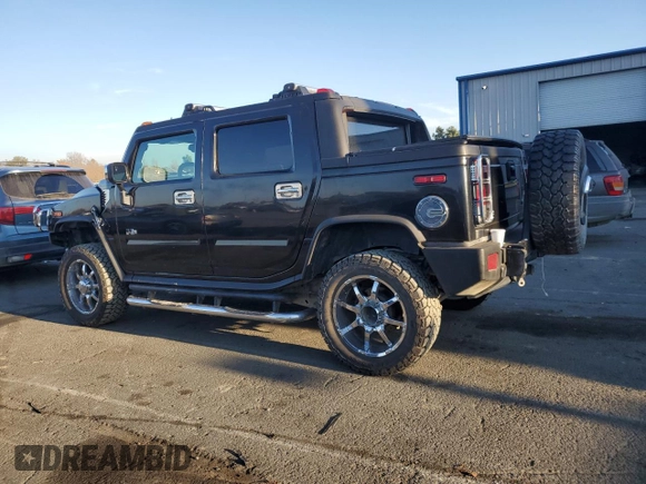 2005 Hummer H2 SUT z VIN 5GRGN22U15H101289, wystawiony jako Copart lot #84107974 z przebiegiem Nie podano mil oraz Szkody całkowita. Historia ofert i sprzedaży dostępna na DreamBid. Obrazek 2.