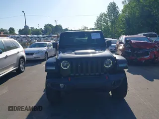 2022 Jeep Wrangler Unlimited Rubicon with VIN 1C4HJXFNXNW149063, listed as a IAAI auction lot 42130171 with 33,961 mi miles and . Bid and sale history available at DreamBid. Image 12.