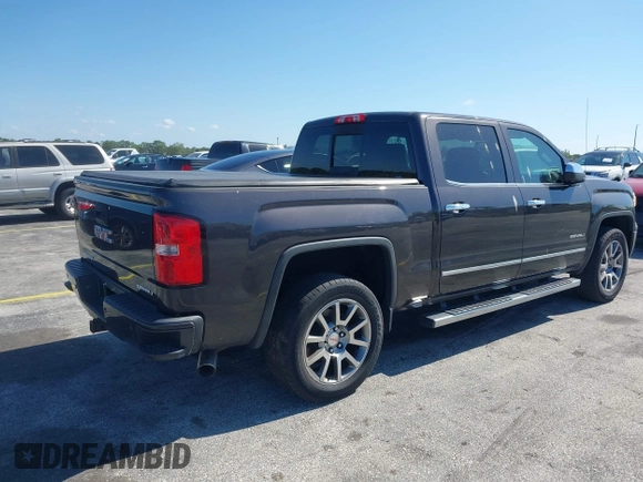 2015 GMC Sierra 1500 Denali with VIN 3GTU2WEC2FG422289, listed as a IAAI auction lot 42023170 with 165,856 mi miles and . Bid and sale history available at DreamBid. Image 4.