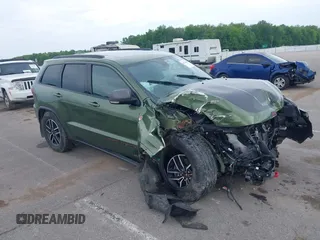 2021 Jeep Grand Cherokee Trailhawk with VIN 1C4RJFLT5MC576913, listed as a IAAI auction lot 42206180 with Not provided miles and . Bid and sale history available at DreamBid. Image 1.