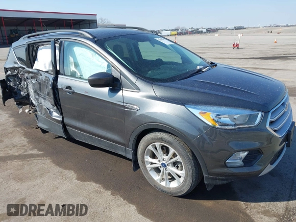 2018 Ford Escape SE z VIN 1FMCU9GD6JUD55937, wystawiony jako IAAI lot #41898592 z przebiegiem 37 800 mil mil oraz . Historia ofert i sprzedaży dostępna na DreamBid. Obrazek 1.