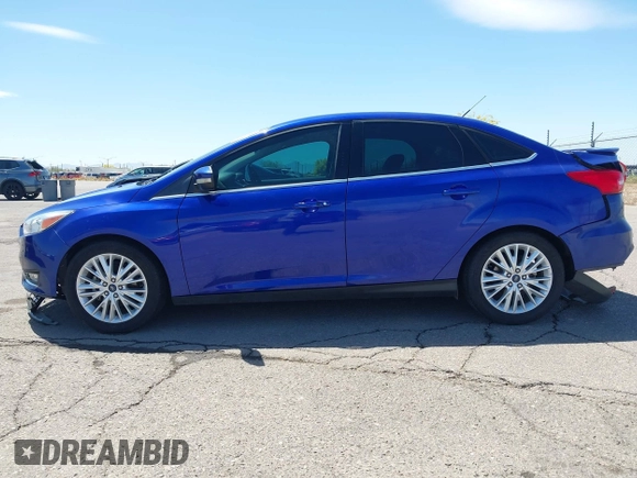 2015 Ford Focus Titanium with VIN 1FADP3J25FL314903, listed as a IAAI auction lot 42053132 with 125,418 mi miles and . Bid and sale history available at carsss.com. Image 15.