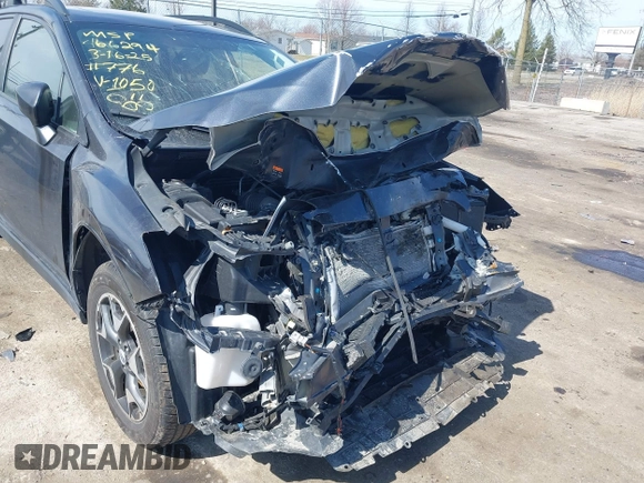 2019 Subaru Crosstrek Premium z VIN JF2GTADC8K8211050, wystawiony jako IAAI lot #41850870 z przebiegiem 98 689 mil mil oraz . Historia ofert i sprzedaży dostępna na DreamBid. Obrazek 6.