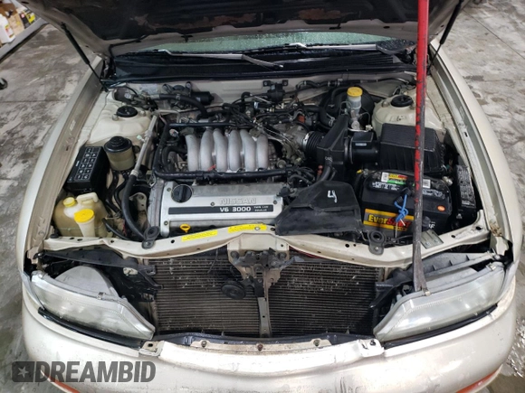 1998 Nissan Maxima GXE with VIN JN1CA21D3WT532196, listed as a Copart auction lot 43210915 with 277,946 mi miles and Salvage title. Bid and sale history available at DreamBid. Image 12.