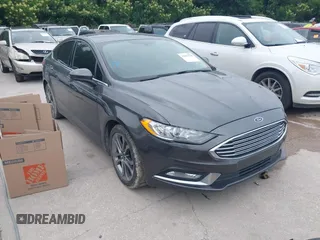 2017 Ford Fusion SE z VIN 3FA6P0HD3HR327877, wystawiony jako IAAI lot #42352570 z przebiegiem 115 096 mil mil oraz . Historia ofert i sprzedaży dostępna na DreamBid. Obrazek 1.