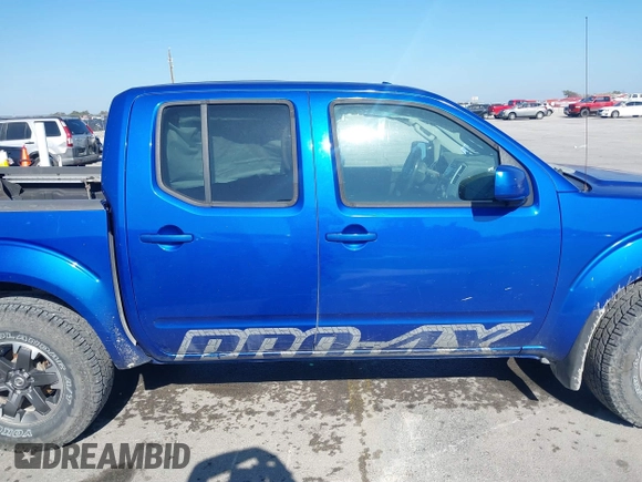 2014 Nissan Frontier SV with VIN 1N6AD0EV4EN720325, listed as a IAAI auction lot 41479133 with 61,661 mi miles and . Bid and sale history available at DreamBid. Image 13.