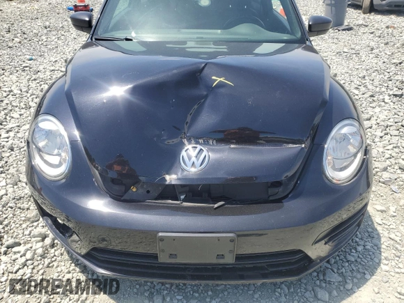 2018 Volkswagen Beetle S z VIN 3VWFD7AT6JM717370, wystawiony jako Copart lot #55814455 z przebiegiem 87 902 mil mil oraz Szkoda całkowita • Salvage title. Historia ofert i sprzedaży dostępna na DreamBid. Obrazek 11.