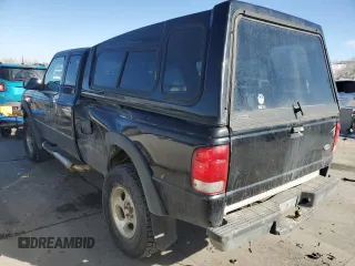 2000 Ford Ranger XLT with VIN 1FTZR15XXYTA37477, listed as a Copart auction lot 43273055 with 160,256 mi miles and Salvage Title. Bid and sale history available at carsss.com. Image 2.