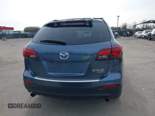 2015 Mazda CX-9 Touring with VIN JM3TB3CVXF0460959, listed as a IAAI auction lot 41940912 with 166,674 mi miles and . Bid and sale history available at DreamBid. Image 16.