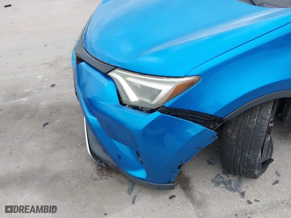 2016 Toyota RAV4 SE with VIN JTMJFREV3GJ076876, listed as a IAAI auction lot 41566899 with 133,216 mi miles. Bid and sale history available at carsss.com. Image 6.